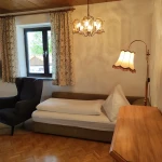 Mozart Wohnzimmer mit Bettsofa thumbnail